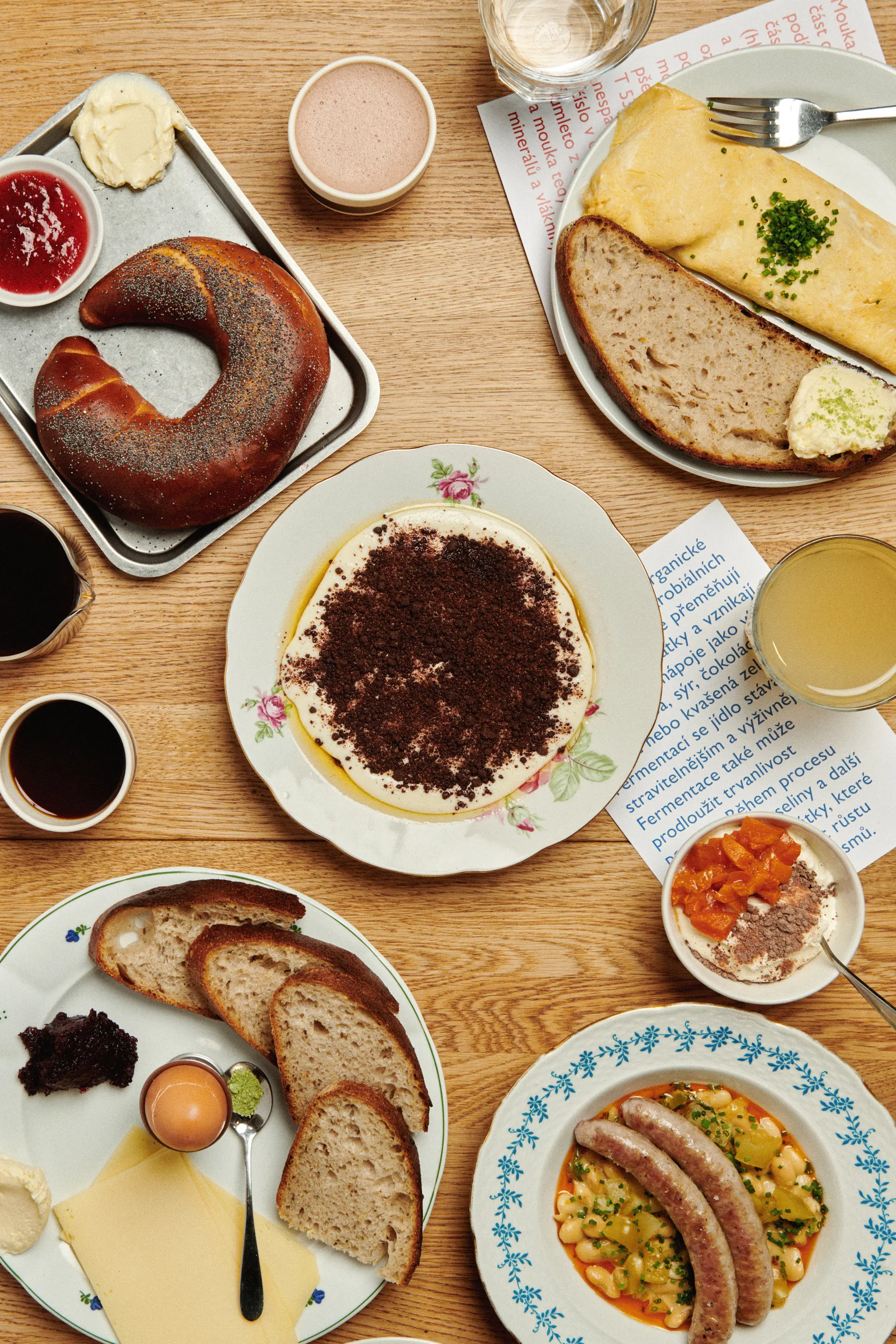 Table spread of breakfast and dishes at Eska restaurant.